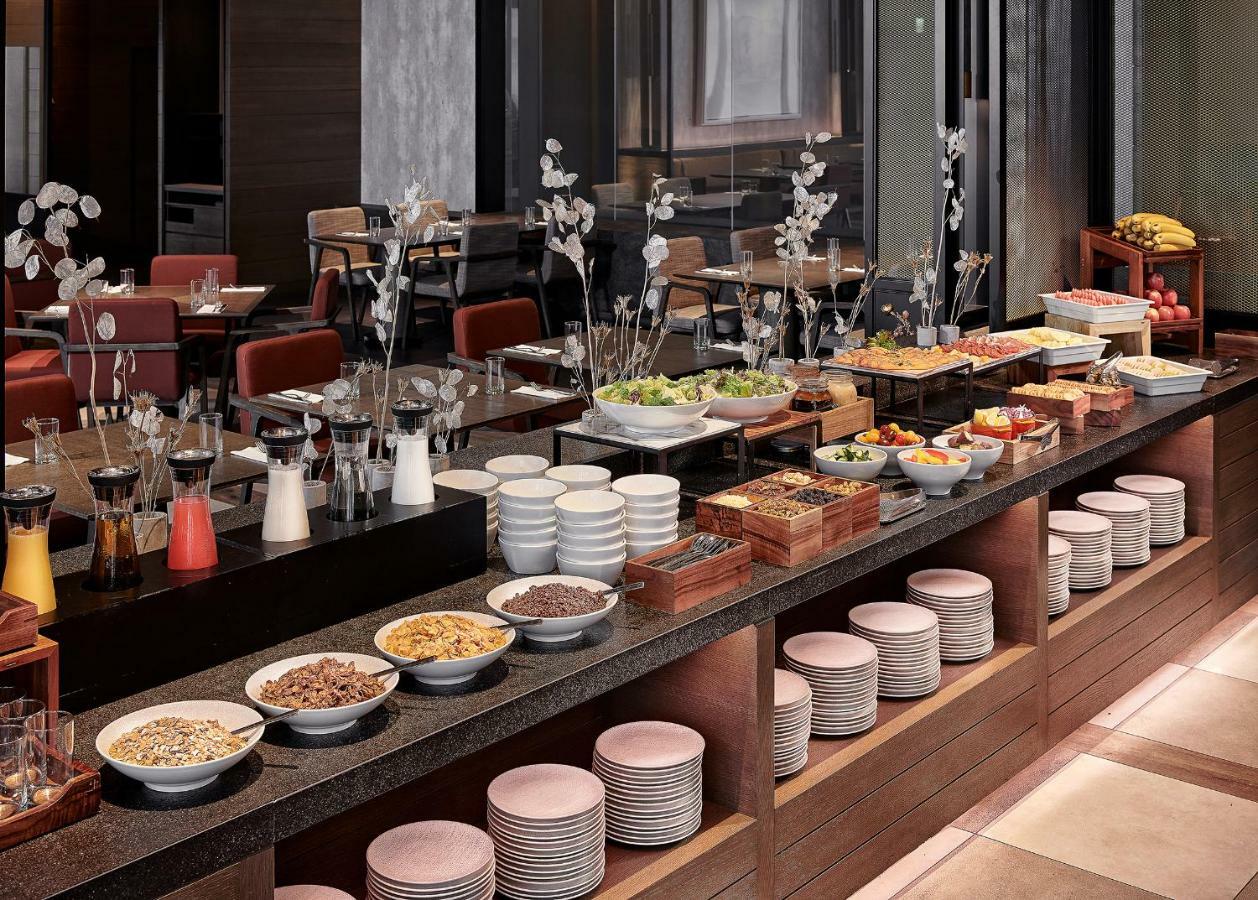 Mu Jiaoxi Hotel Kültér fotó A buffet at a hotel